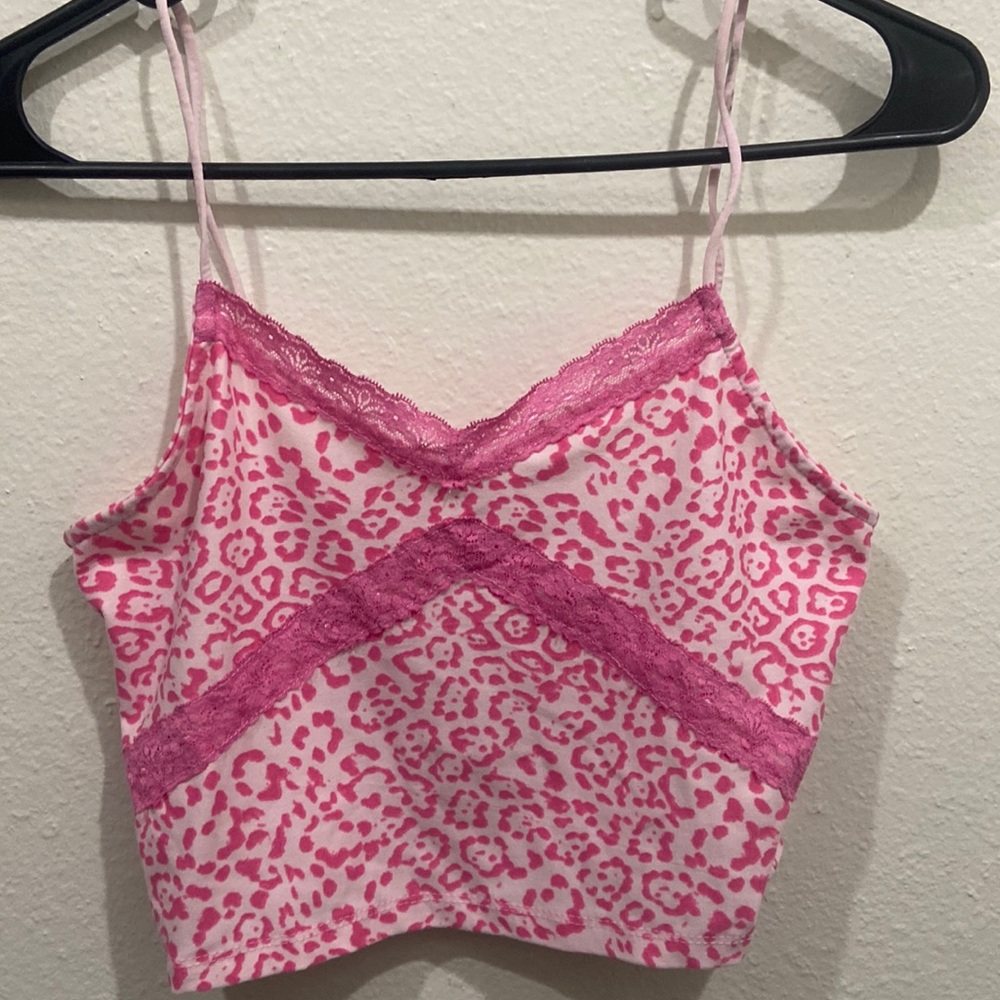 Very stretchy. Lace. Worn once but with a stain on the back of the strap.